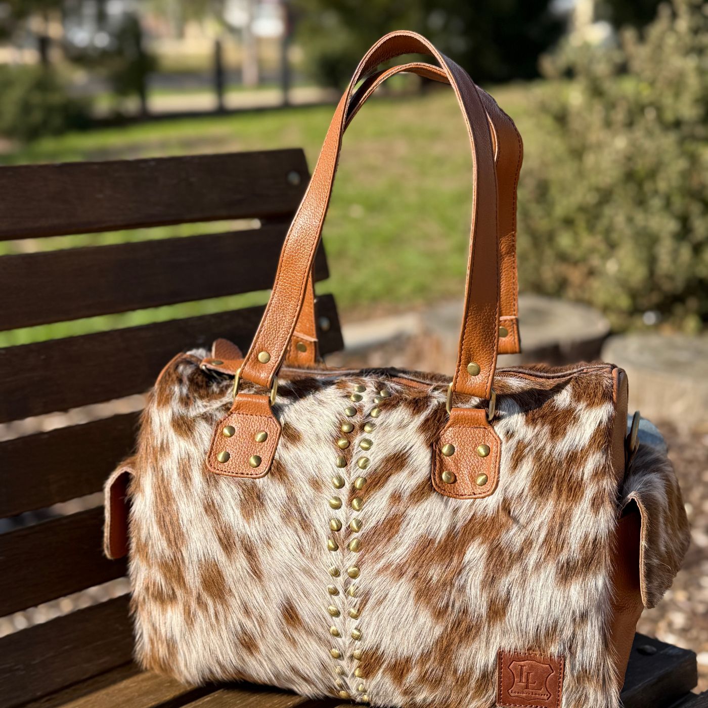 Mini cowhide duffel bag for gym or weekend travel