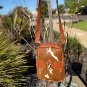 Coach purse shoulder bag made from genuine hair-on cowhide