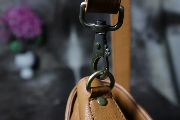 cowhide-buckle-crossbody-bag