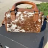 cowhide clutch bag
