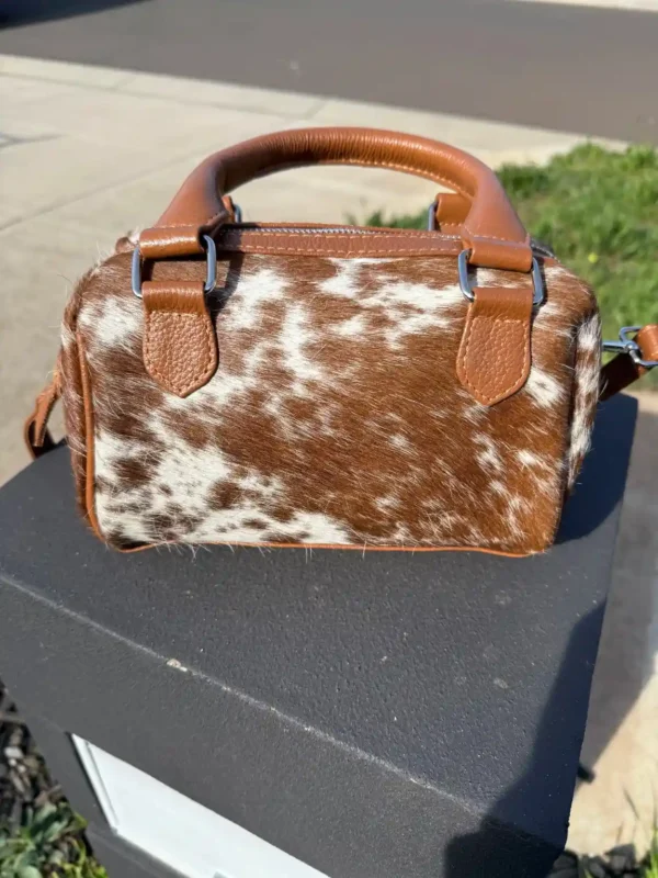 cowhide clutch bag