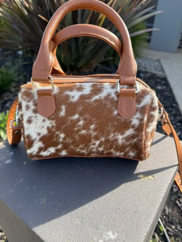 cowhide clutch bag
