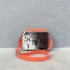Leather cowhide crossbody bag box style purse for women in black brown and orange with adjustable strap large compartment and inside pocket