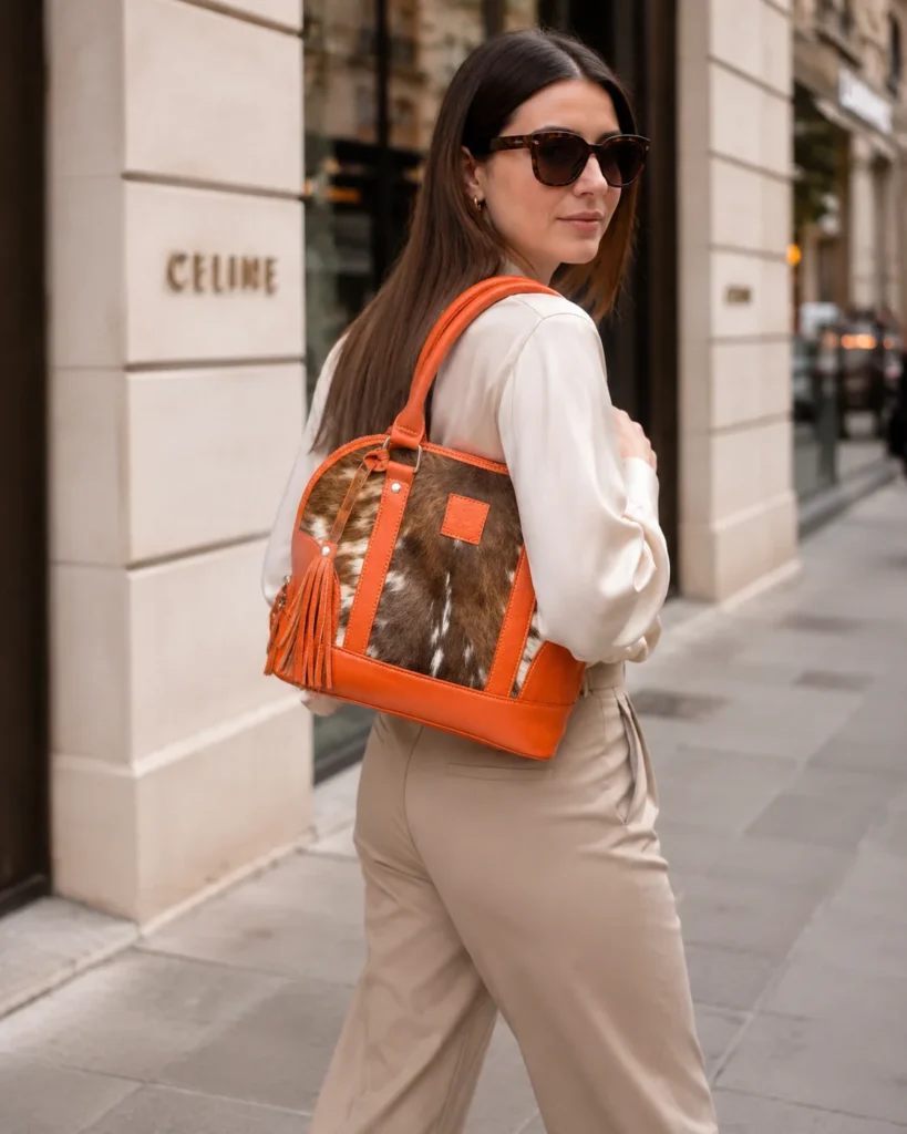 Large orange cowhide tote bag for women made from genuine leather