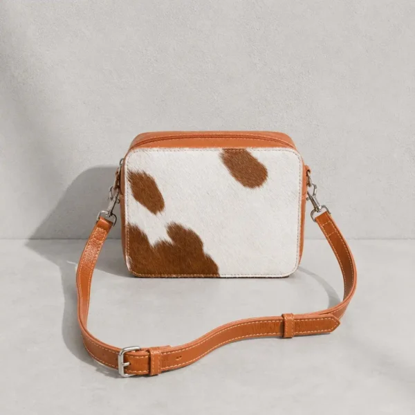 Tan cowhide crossbody bag box style purse for women, leather finish, adjustable strap, large compartment, inside pocket, structured design