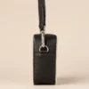 Black cowhide crossbody bag with box style shape, cow finish leather, long strap, large compartment and inside pocket