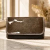 Brown cowhide women flip hand wallet with magnetic flap cover and multiple card compartments