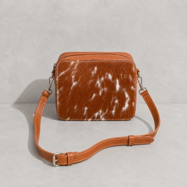 Tan leather cowhide crossbody bag box style purse for women with adjustable strap, large main compartment and inside pocket, structured design