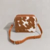 Tan leather cowhide crossbody bag box style purse for women with adjustable strap, large main compartment and inside pocket, structured design