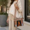 Handmade Durri fabric crossbody purse with hand tooled leather detail