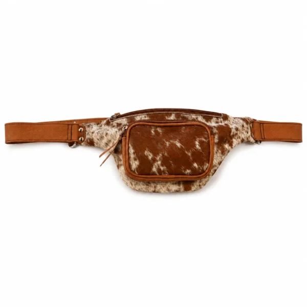 Pink cowhide fanny pack with long fringe and adjustable waist strap