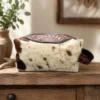 Cowhide toiletry bag with hand tooled leather and zipper compartment