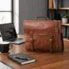 Brown leather laptop bag messenger style with shoulder strap