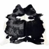 Brazilian cowhide rug in black and white made from genuine cowhide shown on a white background