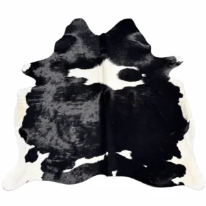 Brazilian cowhide rug in black and white made from genuine cowhide shown on a white background