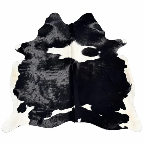 Brazilian cowhide rug in black and white made from genuine cowhide shown on a white background
