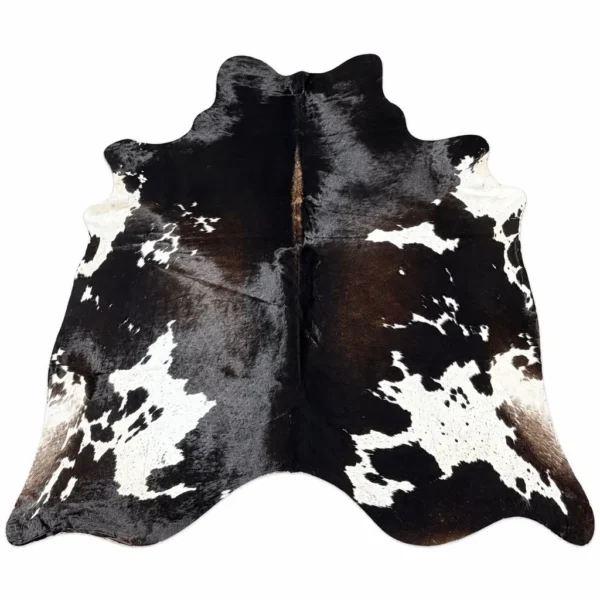 Brazilian cowhide rug in black brown and white speckled made from genuine cowhide shown on a white background