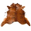 Brazilian cowhide rug in brindle brown made from genuine cowhide shown on a white background