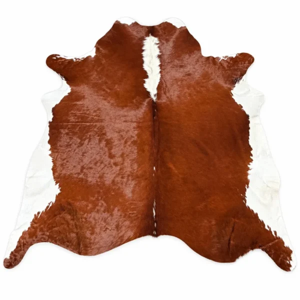 Brazilian cowhide rug in chestnut and white made from genuine cowhide shown on a white background