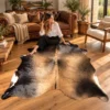 Brazilian cowhide rug in light brindle tan made from genuine cowhide shown in an Australian living room