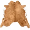 Brazilian cowhide rug in tan and white made from genuine cowhide shown on a white background
