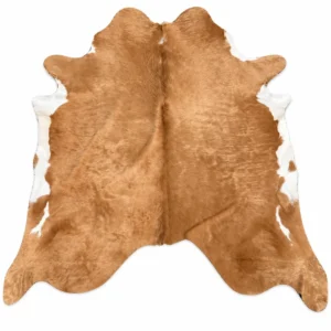Brazilian cowhide rug in tan and white made from genuine cowhide shown on a white background