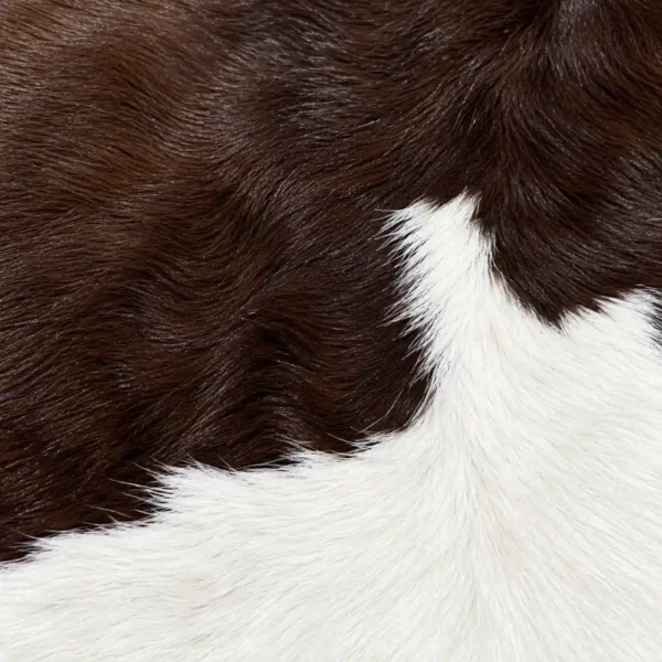 Calf hide rug chocolate brown white - closeup texture