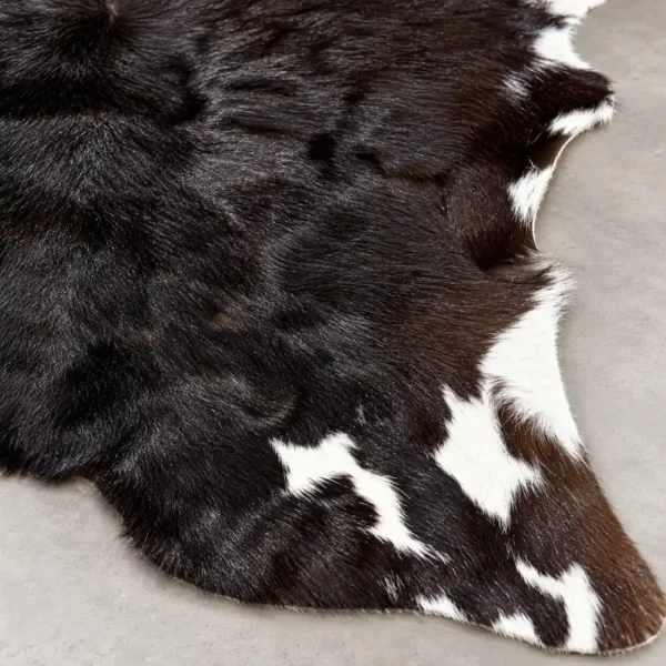 Calf hide rug black brown tricolor - closeup texture