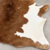 Calf hide rug brown white spine - closeup texture