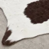 Calf hide rug white bold spots - closeup texture