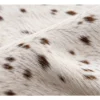 Calf hide rug white fine speckles - closeup texture