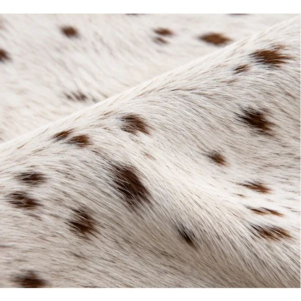 Calf hide rug white fine speckles - closeup texture
