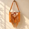 yellow Western fringe crossbody bag with adjustable strap and cowhide patch