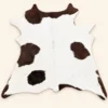 Calf hide rug white dark spotted - main studio