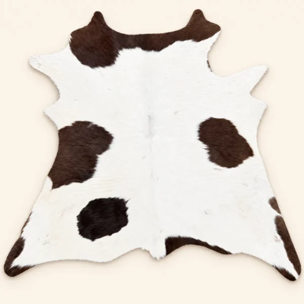 Calf hide rug white dark spotted - main studio