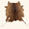 Calf hide rug brown white legs - main studio