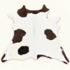 Calf hide rug white bold spots - main studio