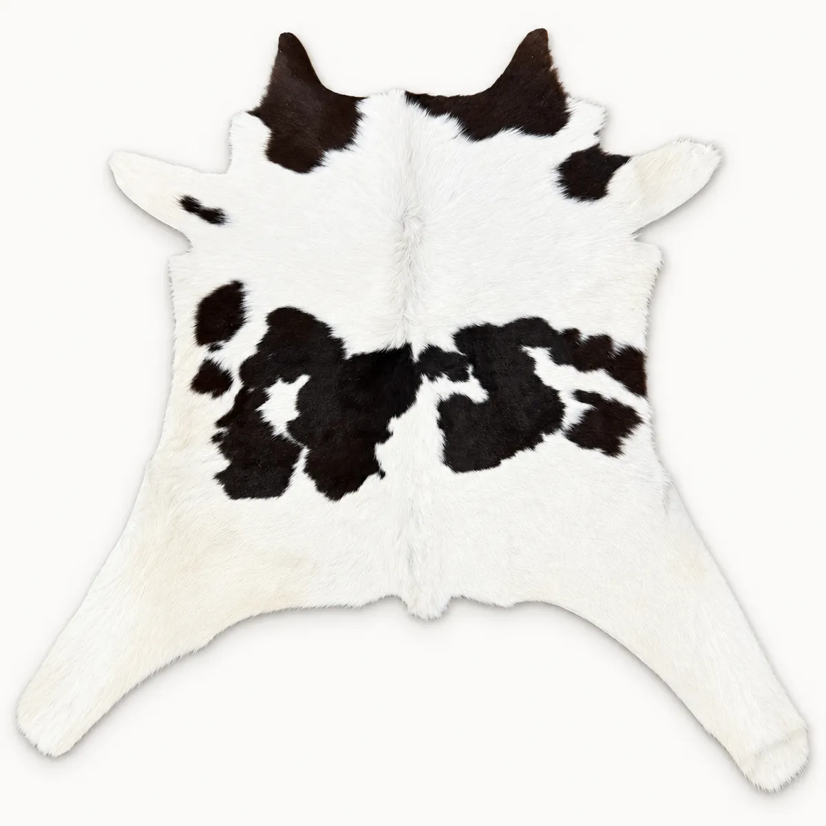 Calf hide rug black white - main studio