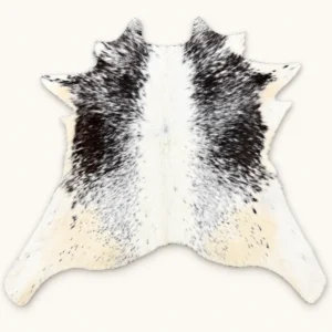 Calf hide rug black white spotted tan edges - main studio